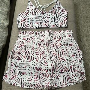 Kinesis brand athletic top and shorts, top is size large, shorts are medium
